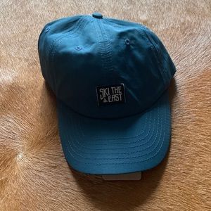 Snap back navy blue hat